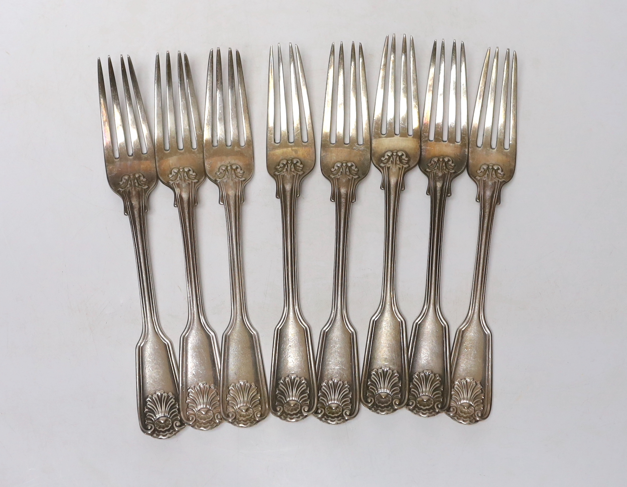 A set of eight Victorian silver fiddle, thread and shell pattern table forks, by George Adams, London, 1859, 20.3cm, 25.8oz.